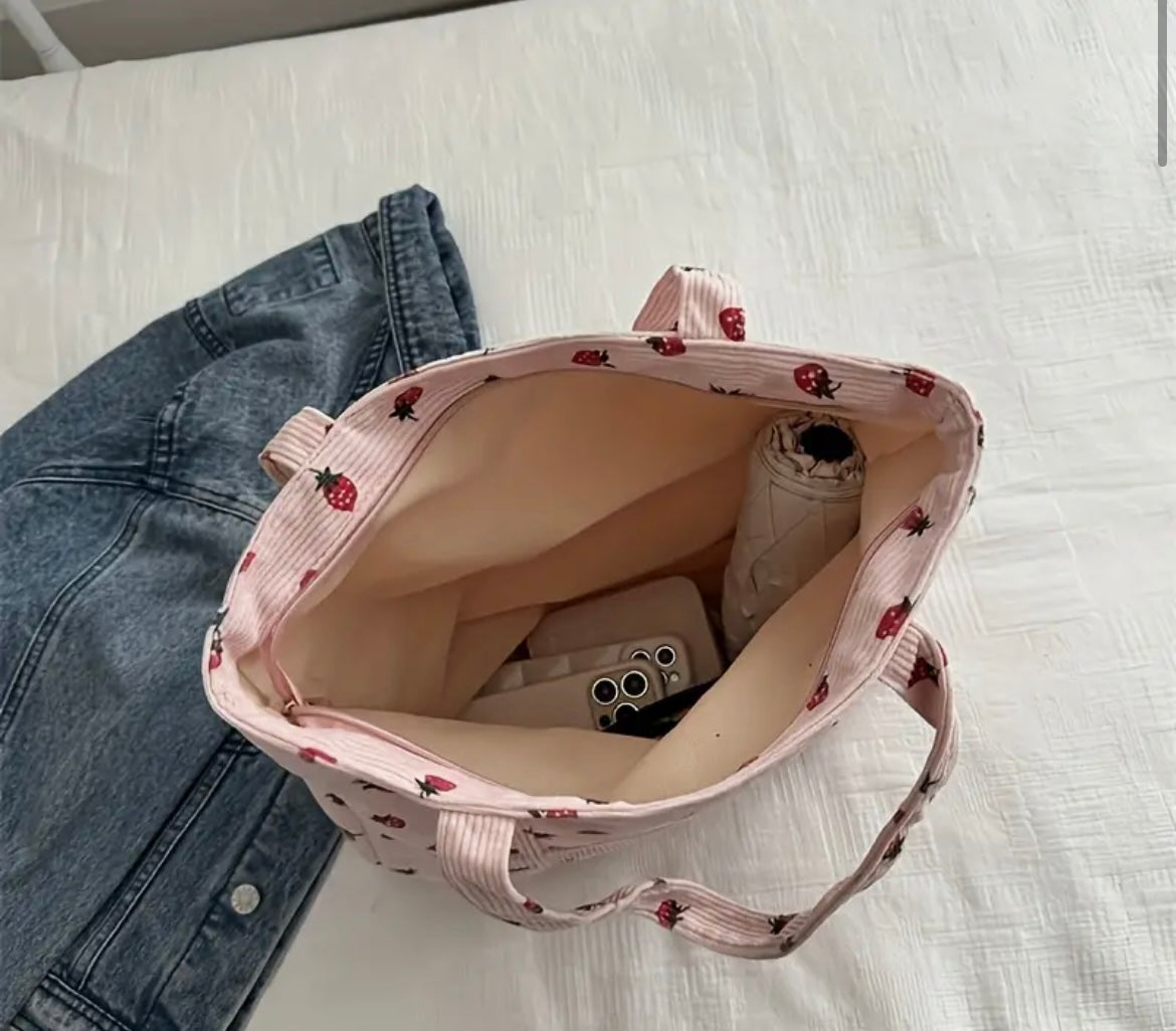 Tote Bag – Large Capacity Fashion Shoulder Handbag with Strawberry Print
A stylish and spacious shoulder handbag featuring a charming strawberry print. Perfect for carrying all your essentials in style, whether you’re heading to work or out for a casual d