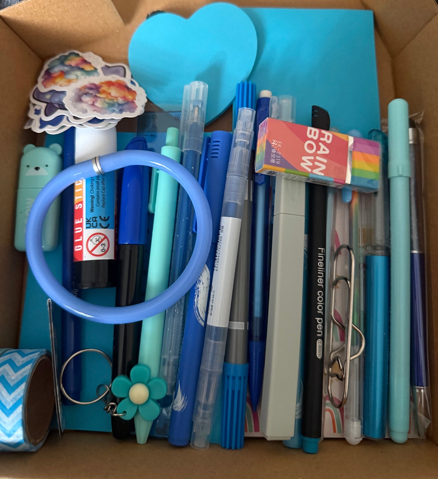 Selection of Stationery Box- A perfect gift idea, this vibrant kit includes a variety of essentials such as Washi Tape, Gel Pens, Notebooks, Sticky Notes, and more. Available in a range of colors to suit every style and creative need.