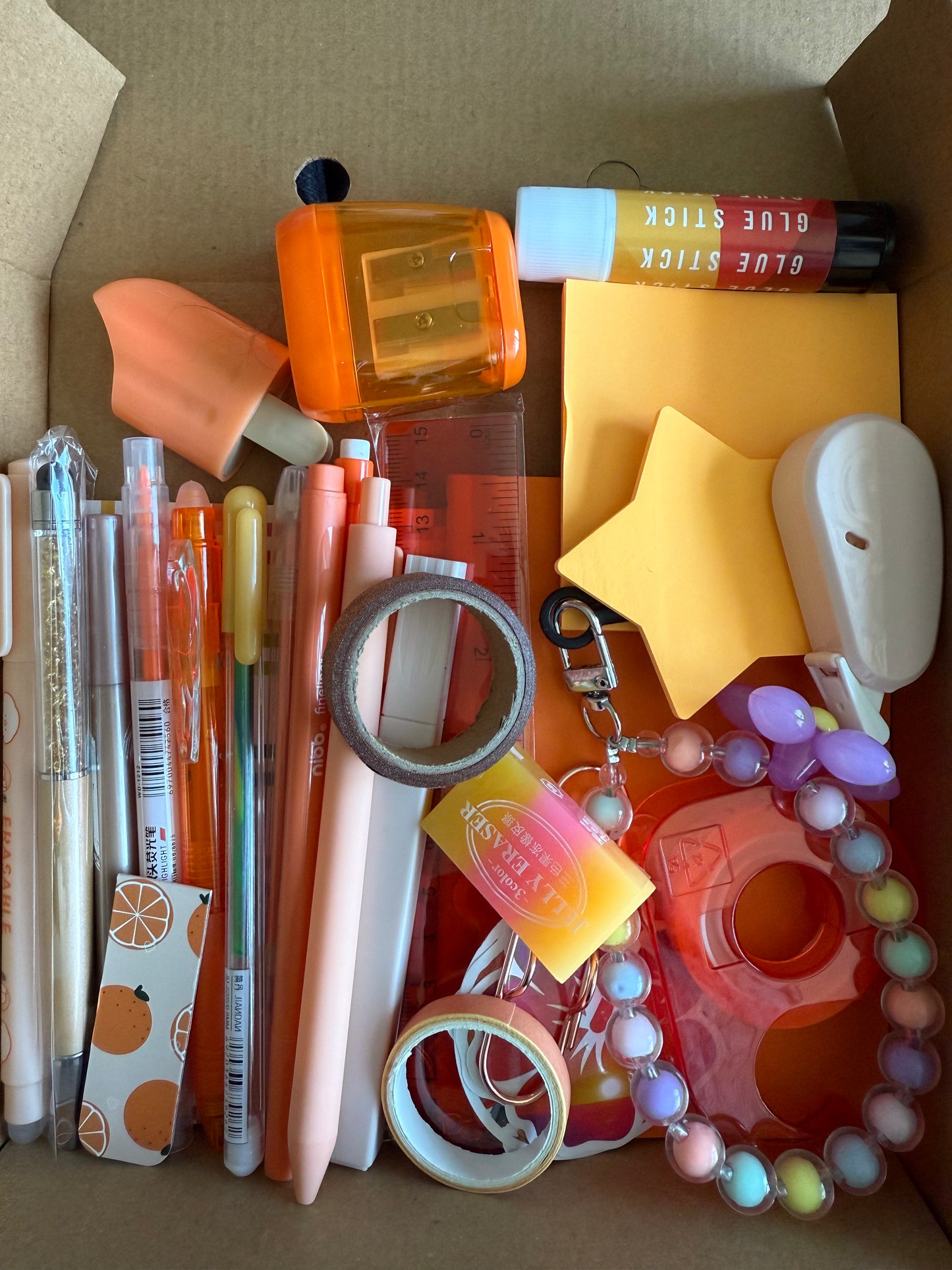 Selection of Stationery Box- A perfect gift idea, this vibrant kit includes a variety of essentials such as Washi Tape, Gel Pens, Notebooks, Sticky Notes, and more. Available in a range of colors to suit every style and creative need.