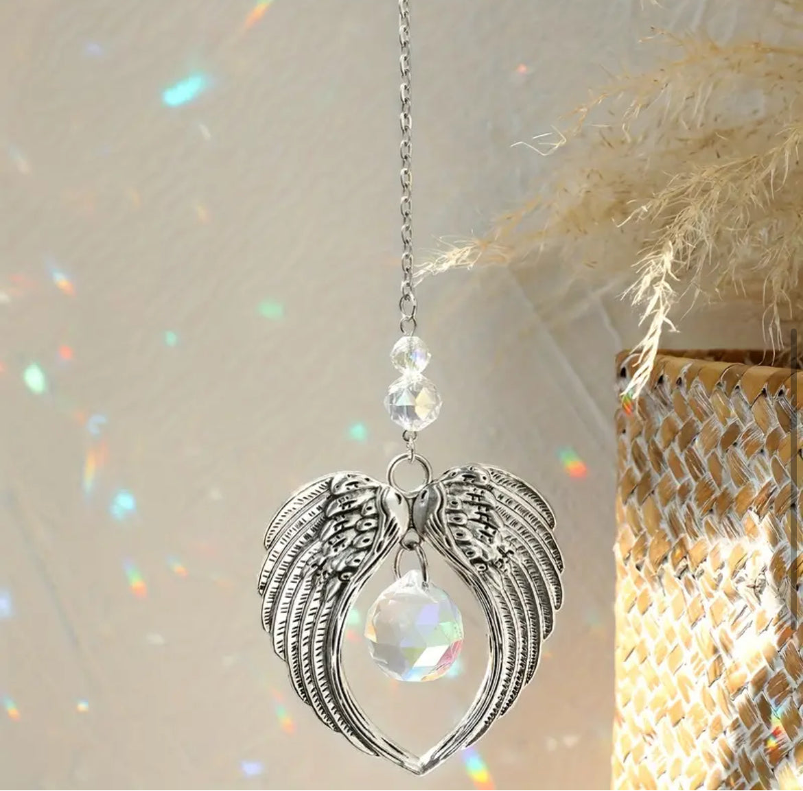 Sun Catcher – Angel Wings with Crystal
A graceful sun catcher featuring delicate angel wings and a shimmering crystal, perfect for bringing a touch of elegance and serenity to your space as it catches the light.