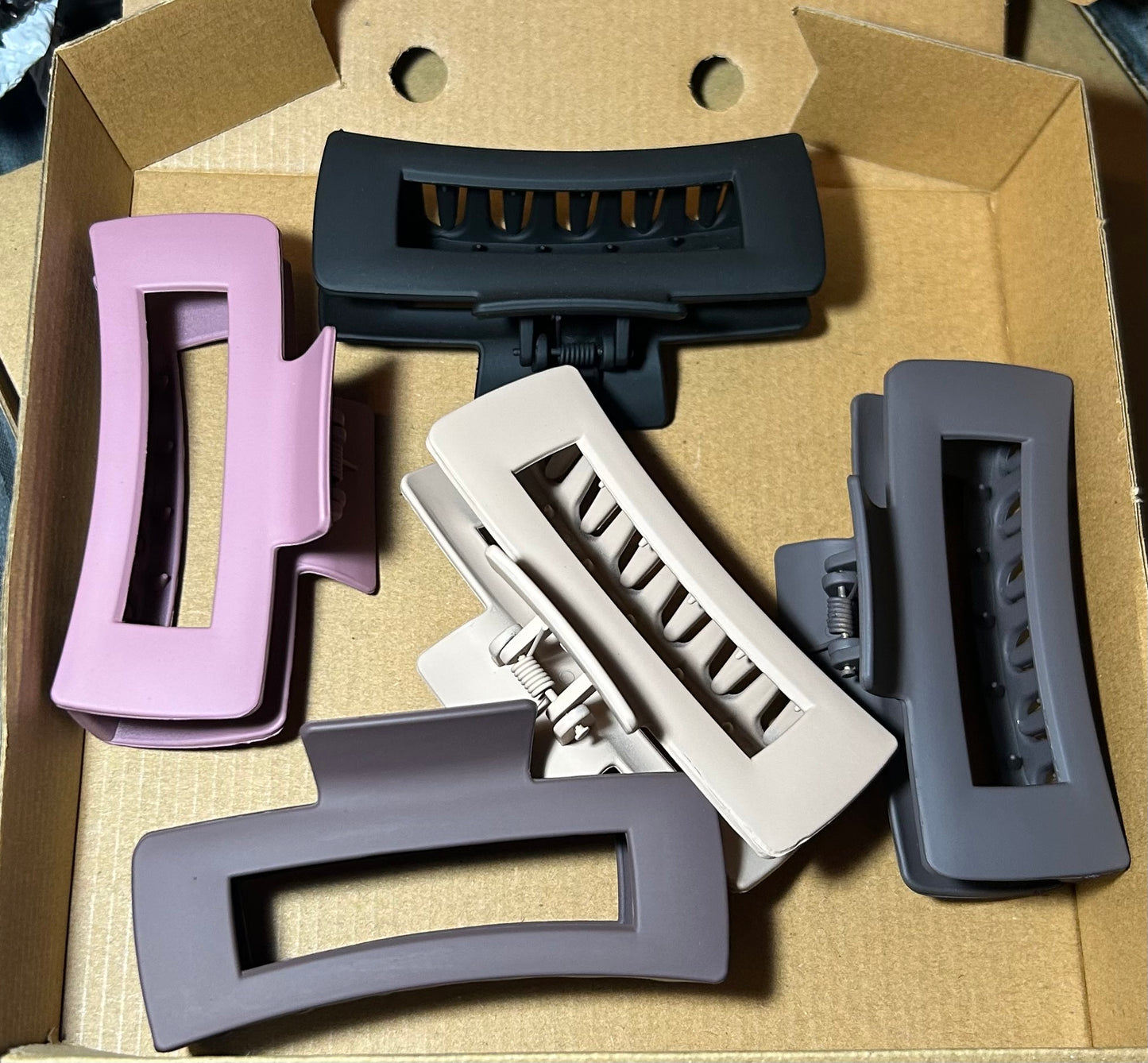 Hair Claw Clip Set – 5 Pieces
A set of elegant dusky pink hair claw clips, neatly packaged in a box. Perfect for adding a touch of sophistication while keeping your hair securely in place.