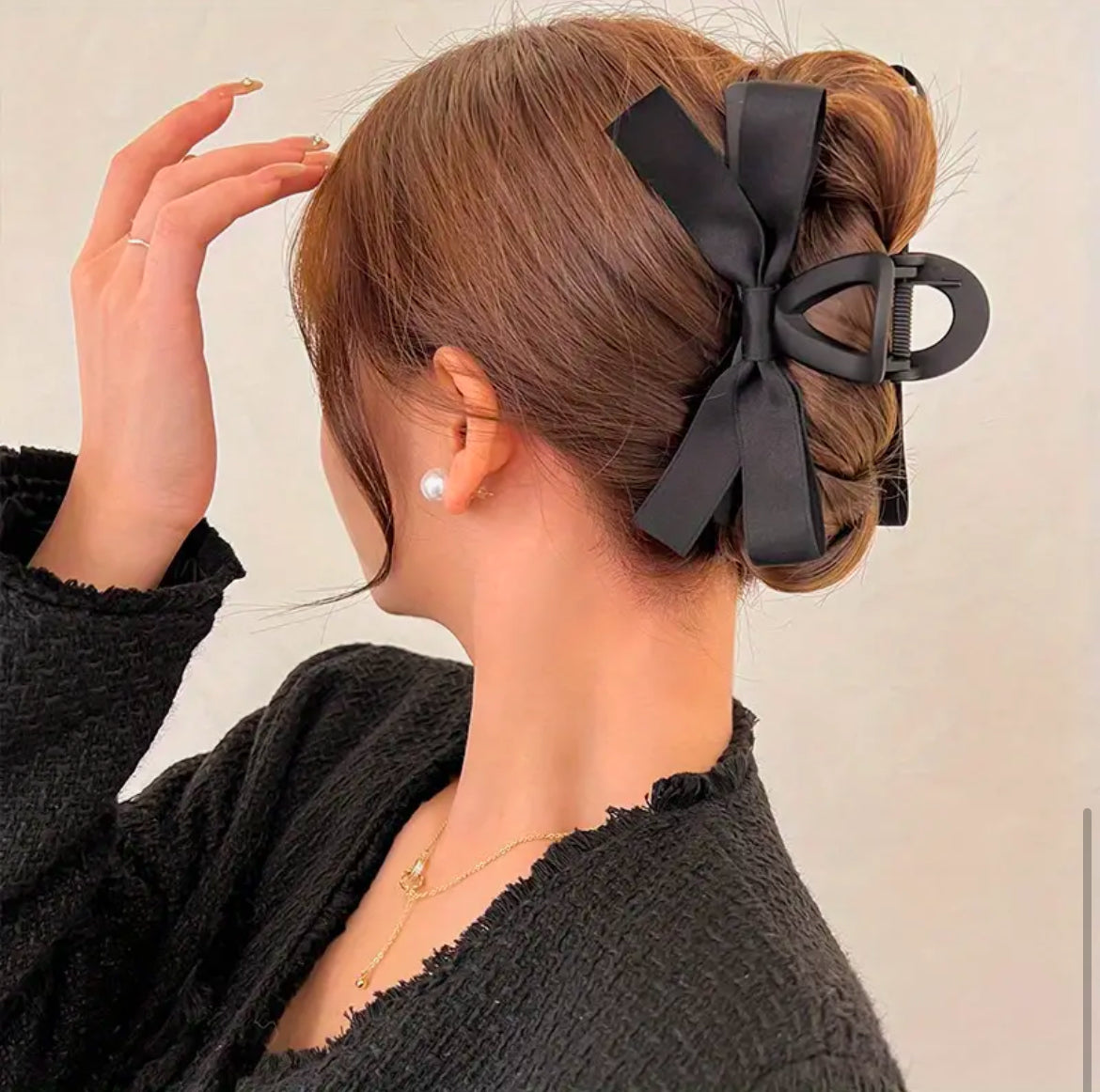Hair Claw Clip – Black Bow
A chic and stylish hair claw clip featuring a classic black bow, perfect for adding a touch of elegance to your hairstyle while keeping hair securely in place.