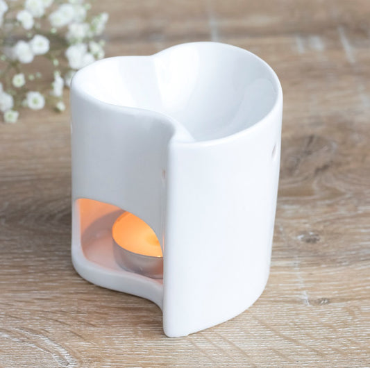 A white ceramic burner- heart design