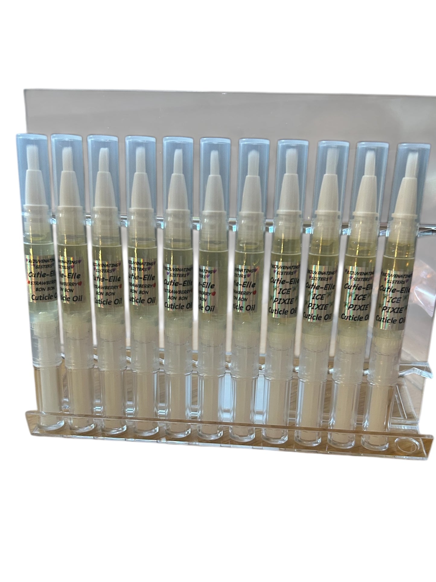 CUTICLE OIL PEN – great scents- nourishing oils: Jojoba Seed, Coconut, Sweet Almond, Argan, and Vitamin E. Available in a variety of soothing scents for healthy, hydrated cuticles on the go.